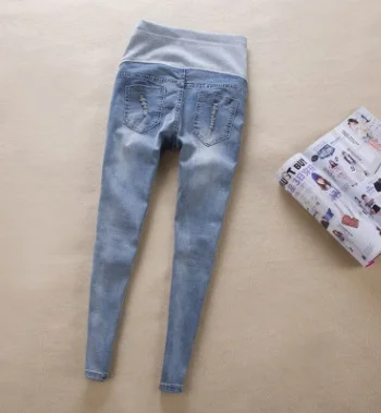 Maternità Dei Jeans Autunno della Molla Denim Tenere Up Del Ventre Pantaloni Della Chiusura Lampo Graffiato Strappato In Gravidanza Pantaloni Della Matita di Abbigliamento