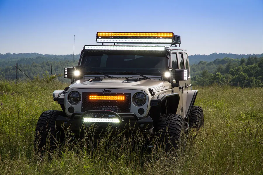 2015-jeep-wrangler-unlimited-rubicon-custom-vandal-rock-krawler-40s-f-three-quarter-lights-on