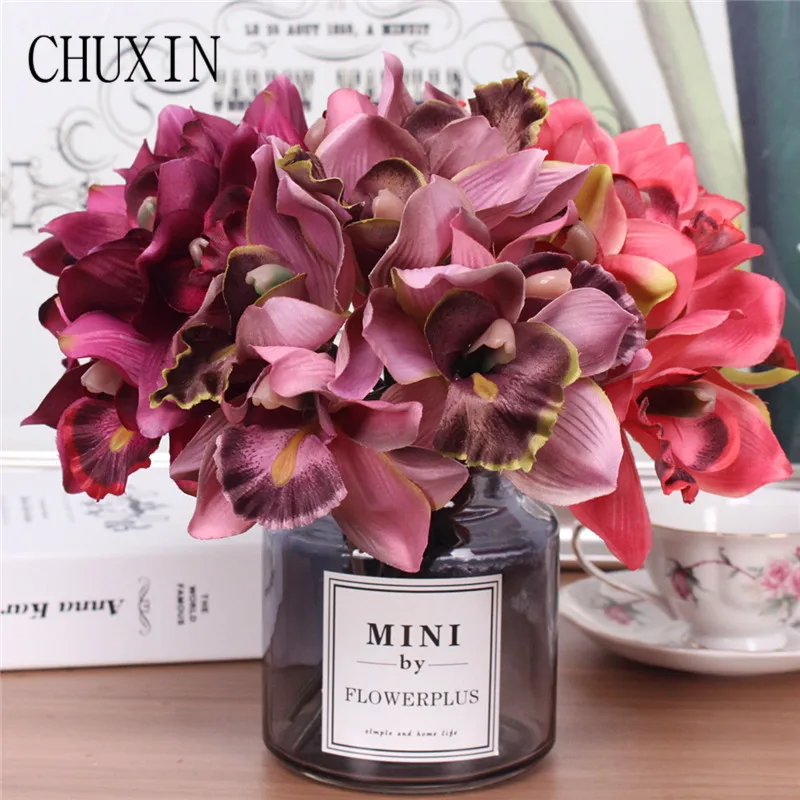 

Artificial flowers 7 head orchid home decoration hotel table fake flower decoration wedding bride bridesmaid holding bouquet