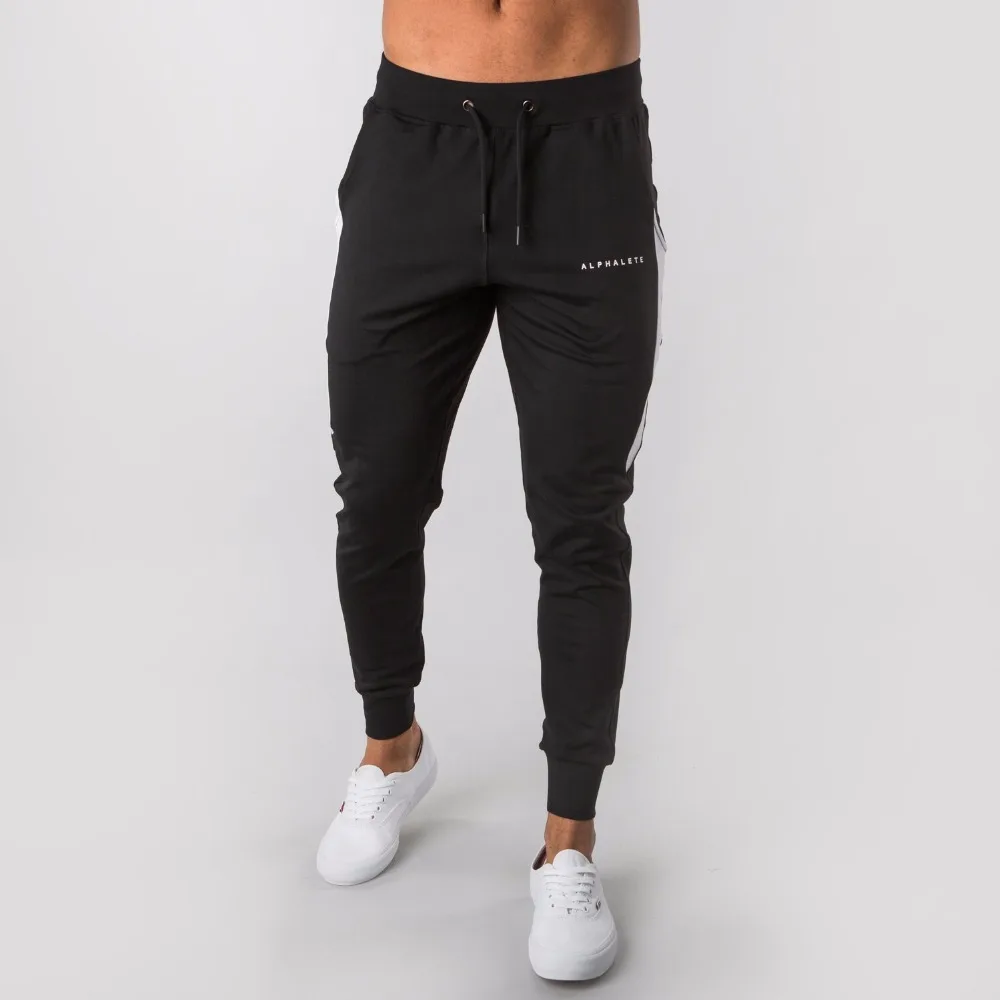 2019 جديد ALPHALETEGyms رجل ركض السراويل اللياقة البدنية عارضة الأزياء العلامة التجارية ركض Sweatpants أسفل Snapback السراويل الرجال سراويل تقليدية 2019 جديد ALPHALETEGyms رجل ركض السراويل اللياقة البدنية عارضة الأزياء العلامة التجارية ركض Sweatpants أسفل Snapback السراويل الرجال سراويل تقليدية