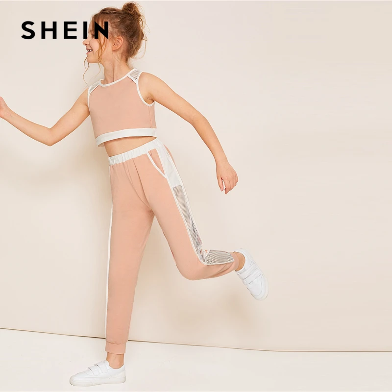 

SHEIN Kiddie Girls Contrast Binding Fishnet Crop Top And Side Striped Leggings Set Summer Active Wear Colorblock Pocket Suit Set