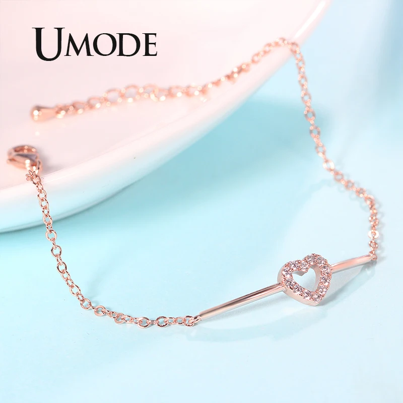 Женский браслет из розового и белого золота UMODE с полым сердцем стразами фианита