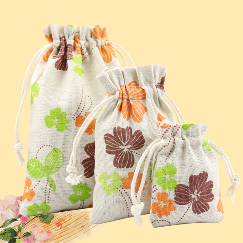 حار 1 قطعة الزهور المطبوعة الخيش هدية الكريسماس أكياس الزفاف الإحسان حقيبة صغيرة برباط مفيدة مجوهرات حقيبة التخزين
