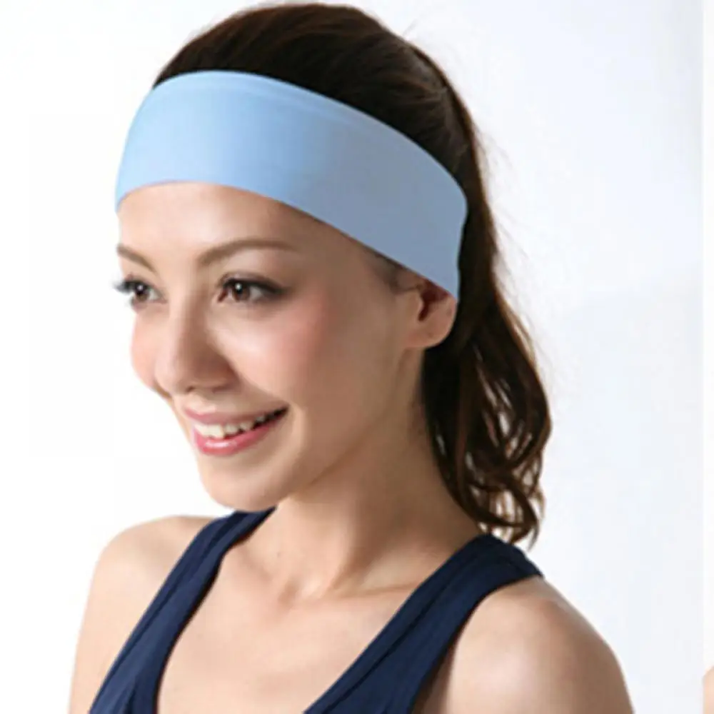 темно синяя повязка на голову. спортивная повязка на лоб. повязка на голову. повязка женская. синяя повязка.