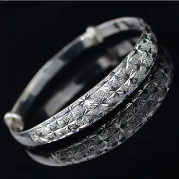 

990 Sterling Silver Carved Star bangle