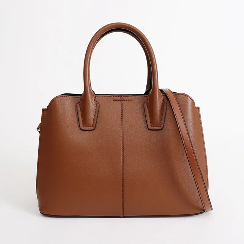 

New fashion leather handbags Messenger bag Europe and America commuter wild Tot Ms. cowhide bag large capacity