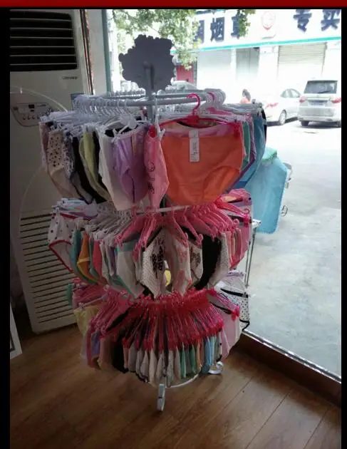 

The coat rack is a round multi-layer rotating underwear display rack