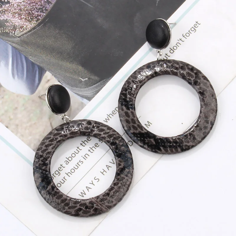 hollowed out round earrings