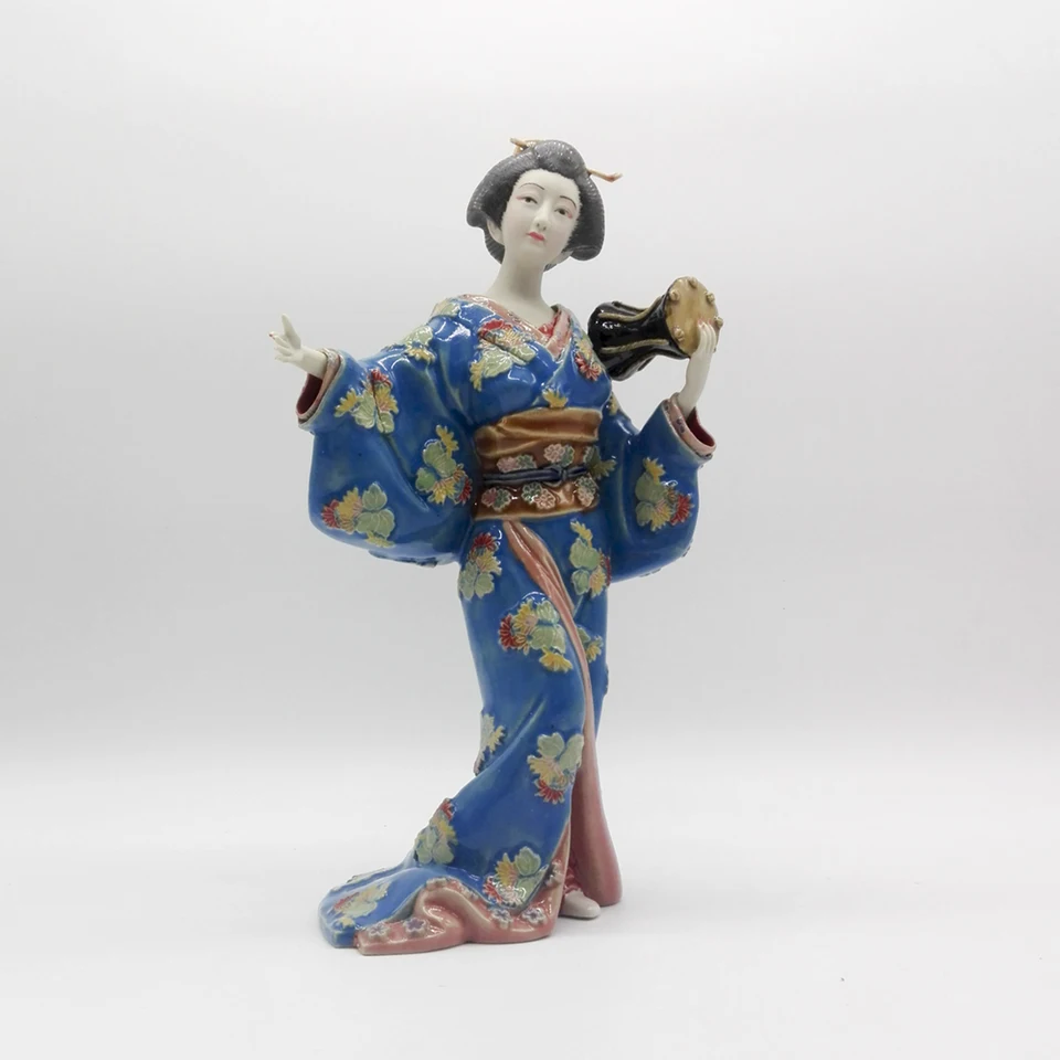 porcelain geisha doll