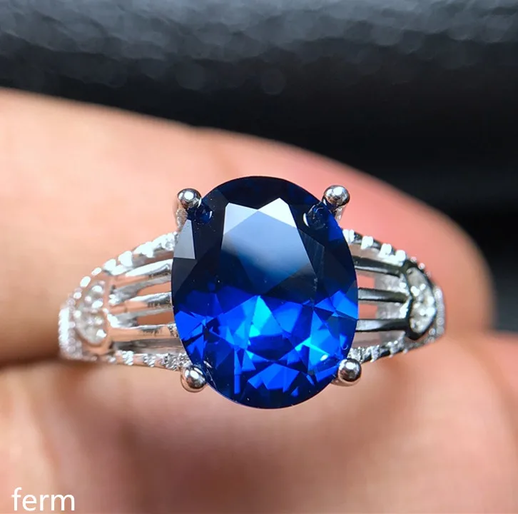 KJJEAXCMY fine jewelry 925 чистого серебра, инкрустированные с натуральный голубой топаз кольцо с небольшой и необычных цветов