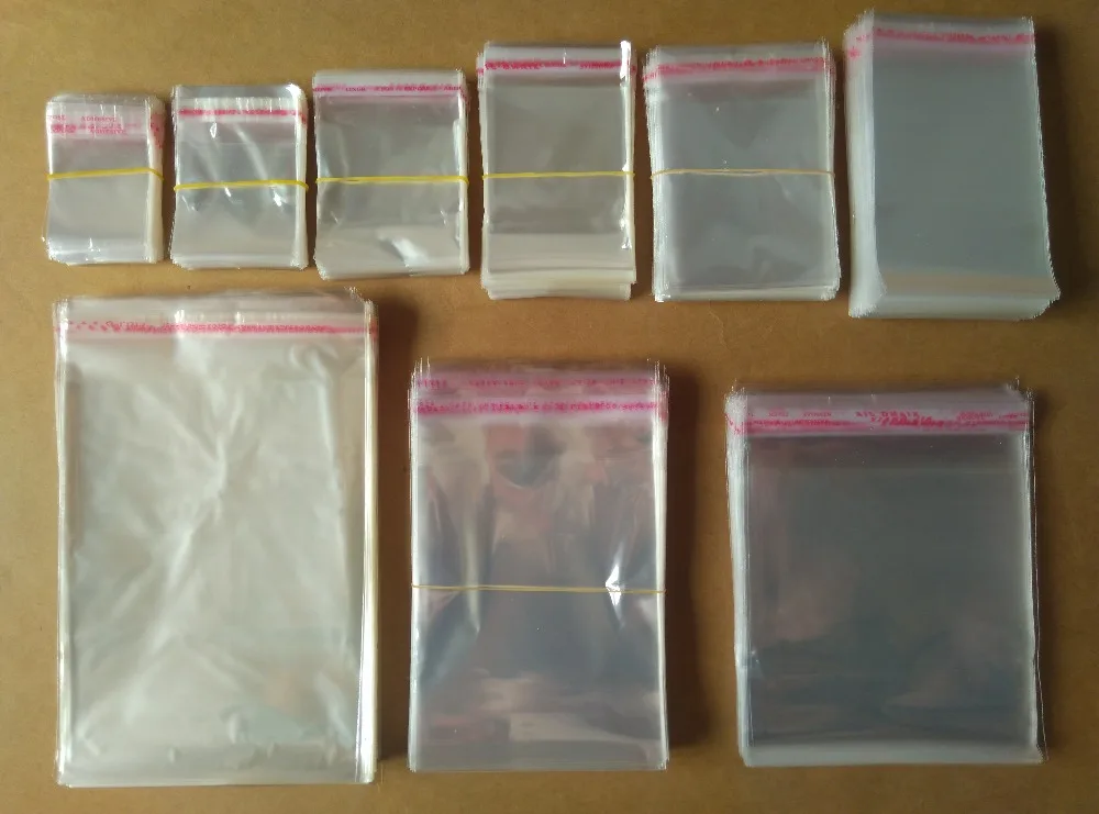 

Free shipping 100pcs 20x29cm/18x34cm/20x34cm/ 22x34cm/ 24x34cm/ 25x39cm Clear Self Adhesive Seal Plastic Packaging Bag OPP pouch