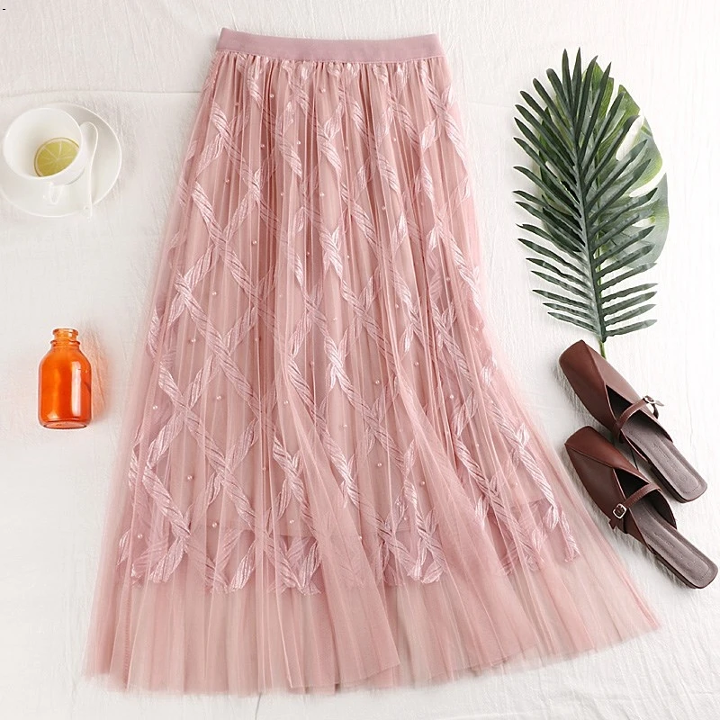 

Mesh long skirts female long section 2019 spring new high waist pleated beaded gentle fairy big pen A word skirt women