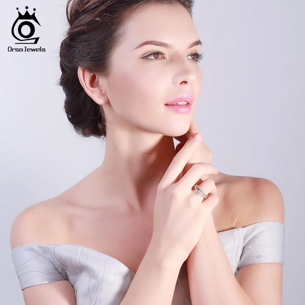 ORSA JEWELS Fashion Women Rings Cross Shape Prong Setting AAA Cubic Zirconia paved Silver Color Anniversary Ring Jewelry AOR64
