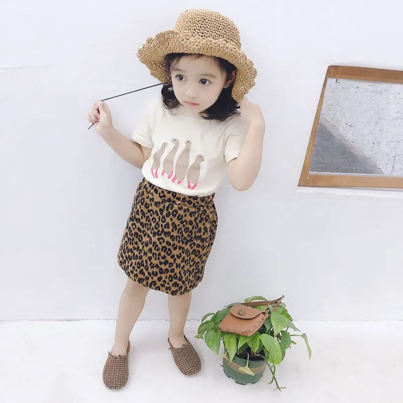 Детские юбки для девочек Летняя коллекция года, новая короткая юбка для девочек Корейская Милая юбка с леопардовым принтом и металлической пуговицей для малышей