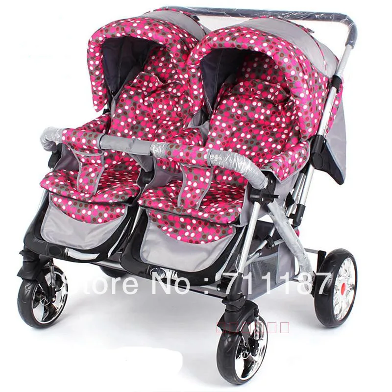 pink and blue double stroller