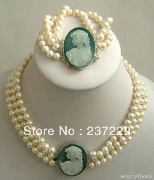 

Wholesale price Fast shipping + aGenuine White Pearl 18KWGP Shell Carve Goddess Clasp Necklace Bracelet Set (A0516)