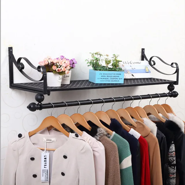 Iron clothing on display clothing racks garment rack shelf clothes