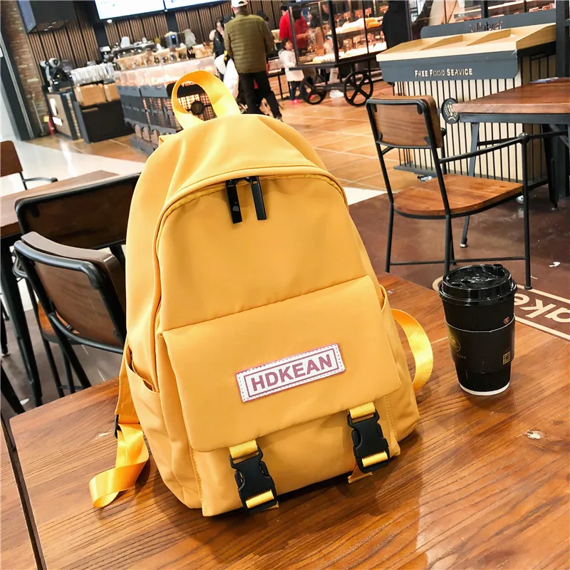 

DCIMOR Women Backpack Fashion Button Waterproof Nylon Backpacks Large capacity travel bag School Bags For Teenager Girls Mochila