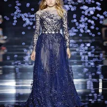 Изящные темно синий овальный дизайн Платья знаменитостей с Аппликация, украшение вечернее платье из тюля платье для выпускного бала Vestidos