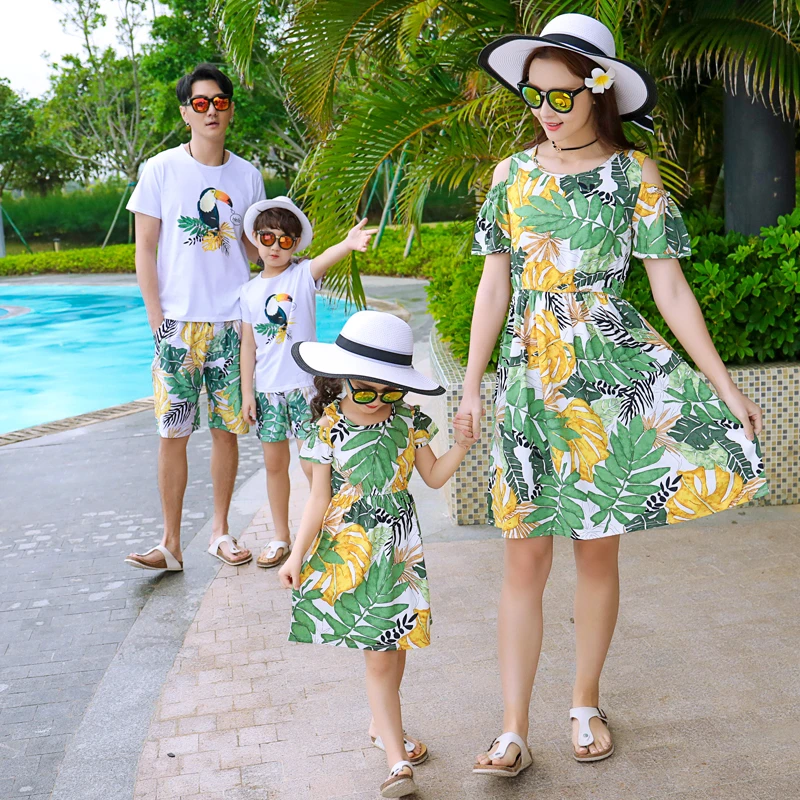 mother dresses son