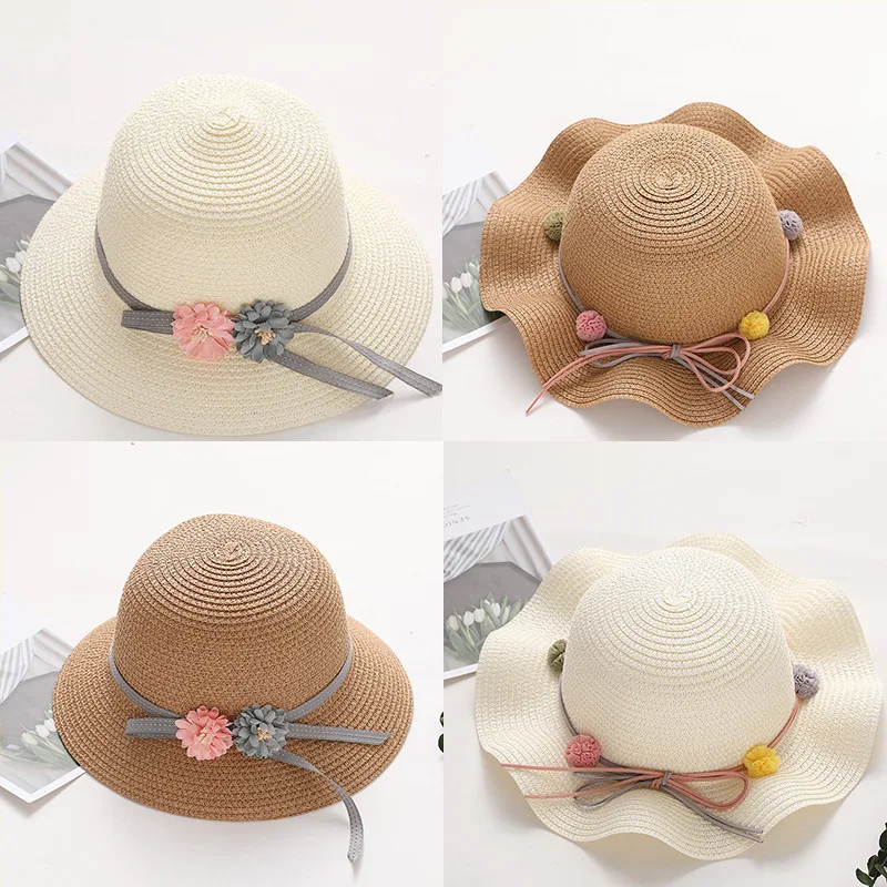 

2019 summer baby girl straw wavy along straw hat Korean version of mixed color sunscreen visor bow garland beach sun hat beanies
