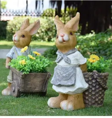 

Outdoor cartoon rabbit flower jar. Sculpture of garden landscape sculpture. Simulation of animal decoration