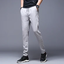 Брюки летние мужские шелковые тонкие спортивные брюки большого размера 28-38 мужские повседневные хлопковые удобные свободные брюки
