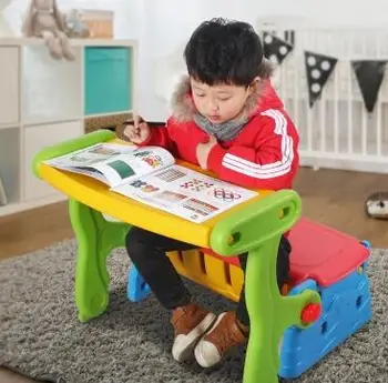 

Little children folding tables and chairs. The table learning toys