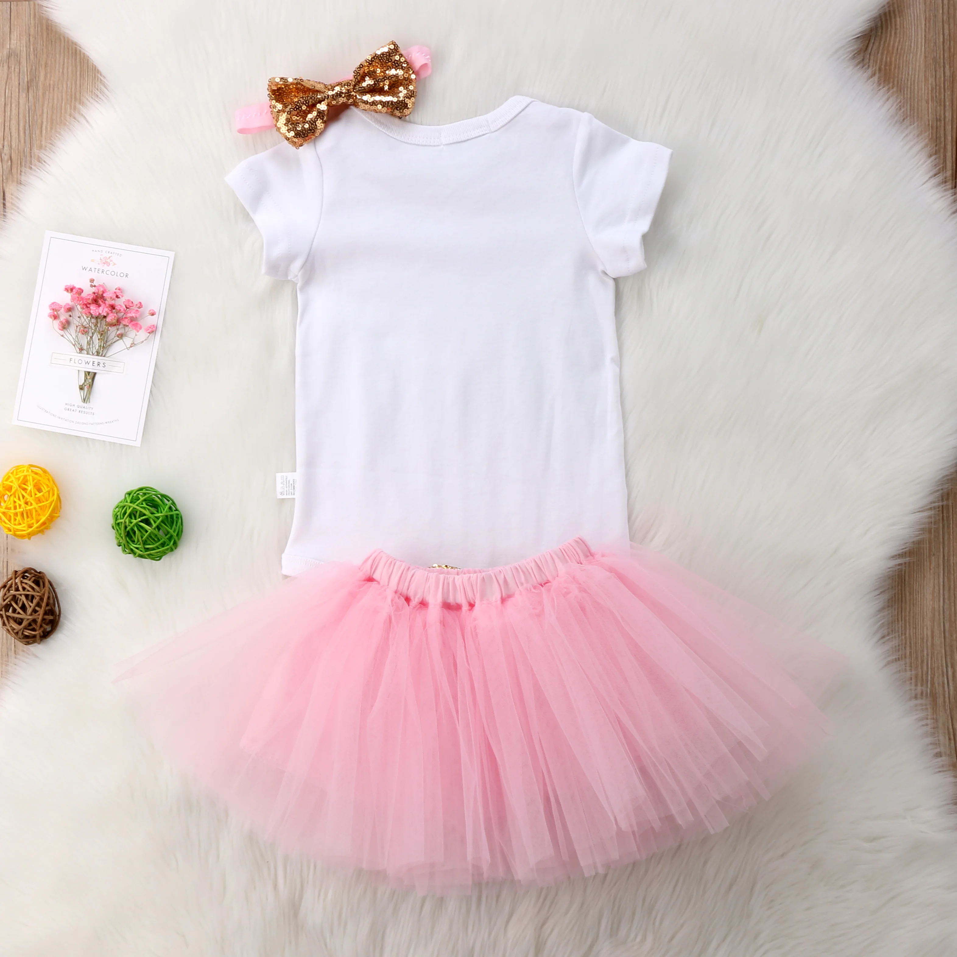 babygrow with tutu attached