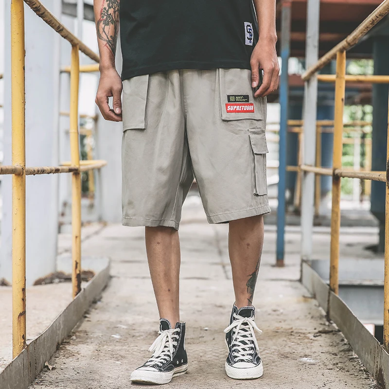 Летние эластичный лоскутный пояс бриджи с низкой талией Для мужчин Мульти-карман трусы на верёвочках комбинезоны