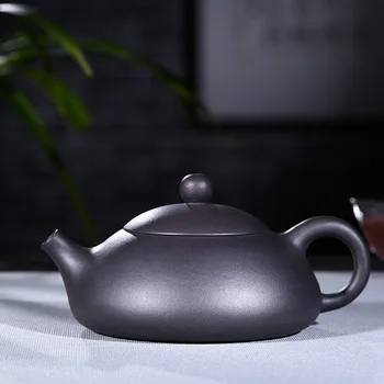 

by the real thing all hand undressed ore black mud east gourd ladle pot ball hole water kung fu tea set the teapot