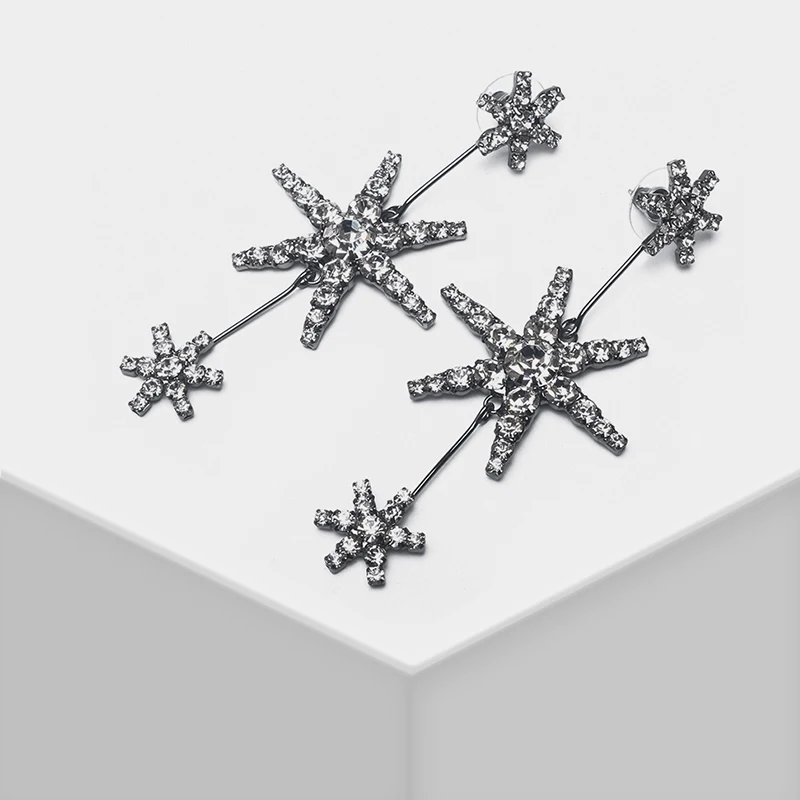 

Glitter snowflake design for chic refined drop earrings