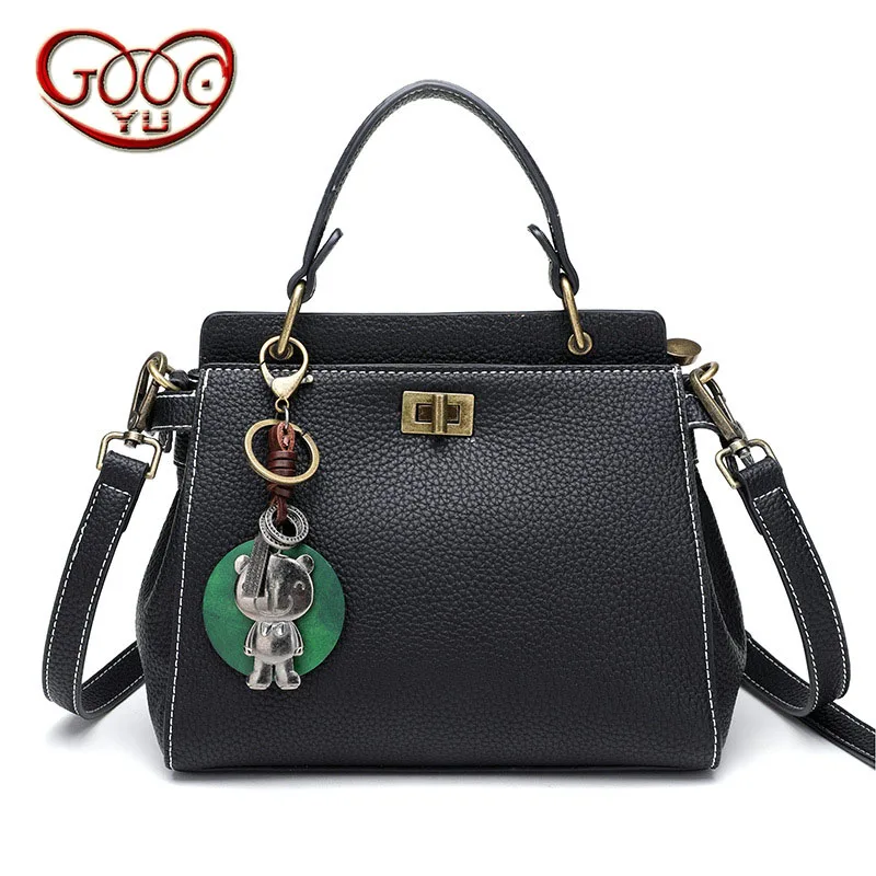 

High-quality PU leather litchi pattern with hanging buckets European-style vertical style portable Messenger bag