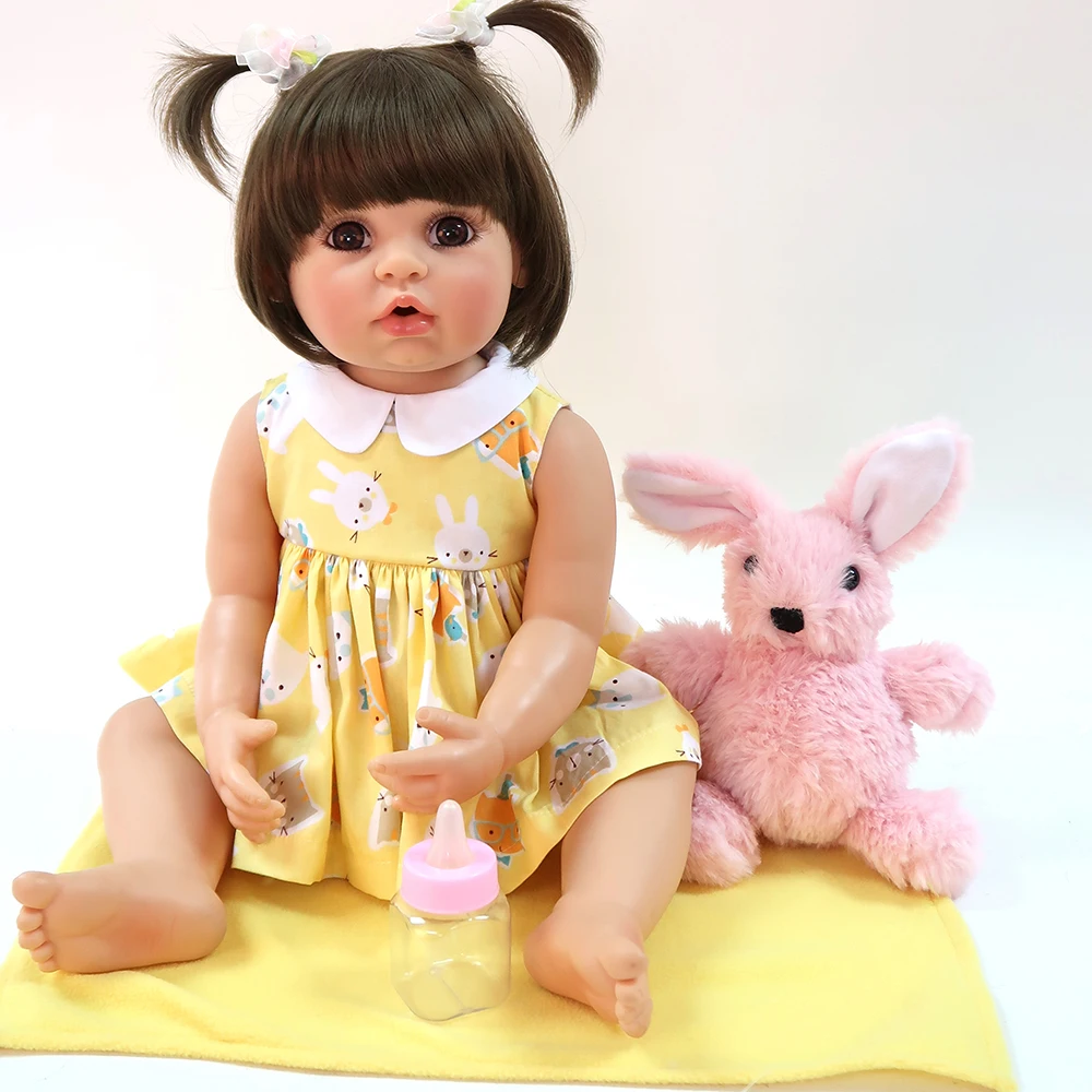 

Pink rabbit with Latest unique silicone Reborn 55cm Doll Realistic Baby Doll For Girls brown eyes princess toys the hottest DOLL