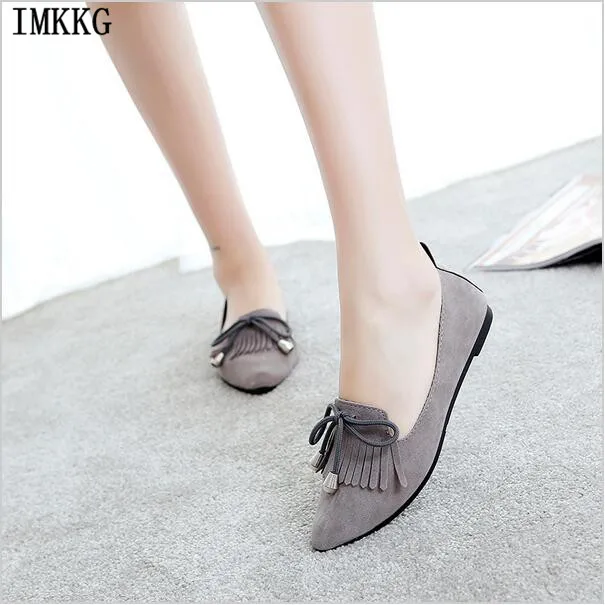 pointed toe flats with tassels