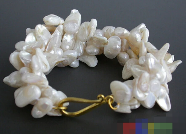 

FREE SHIPPING>>>@@ > 09772 4row white tail wine Freshwater cultured pearl BRACELET