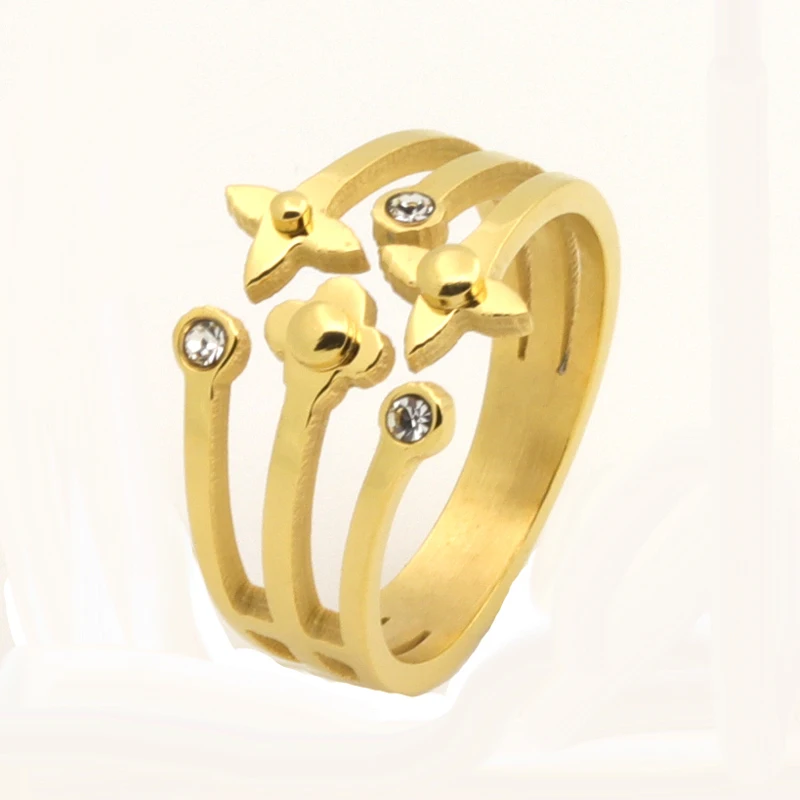 Купить женское кольцо из нержавеющей стали золотистое с кристаллами