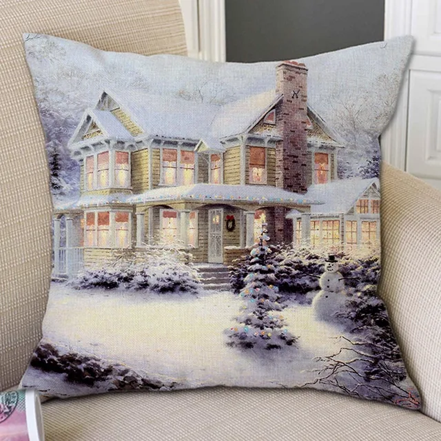 아늑함과 축제적인 분위기로 가득 찬 눈 덮인 집 크리스마스 장식 베개