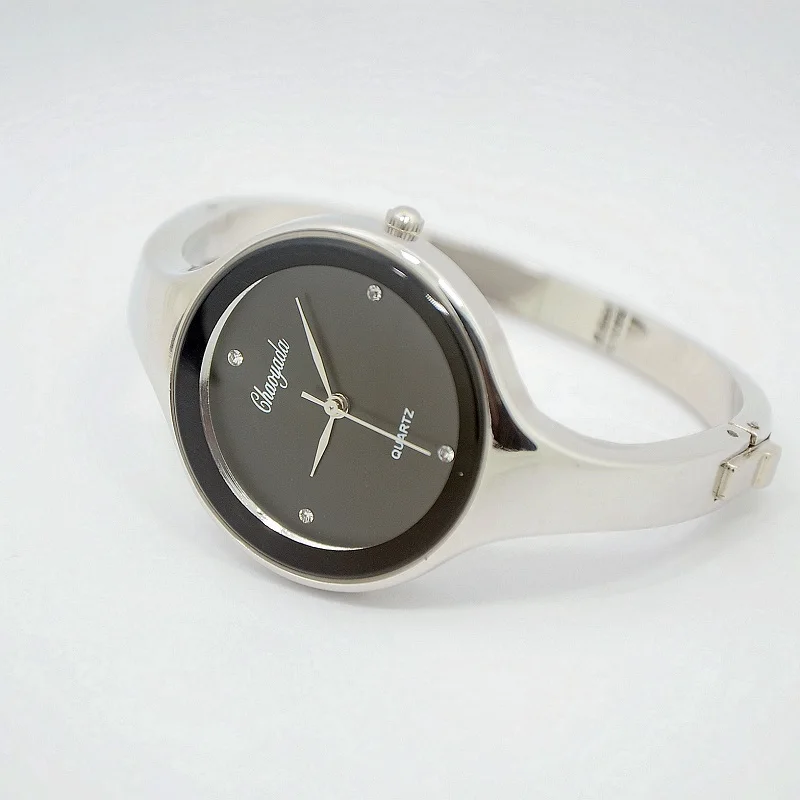

2017 Top Brand Women Bracelet Watches Crystal Dress Ladies fashion Stailess Steel Round Dial unique designer quartz watch