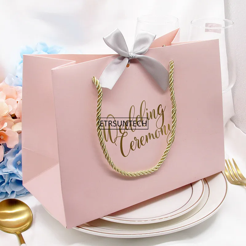 100pcs High quality gifts Bow gift bag Portable paper bag Wedding