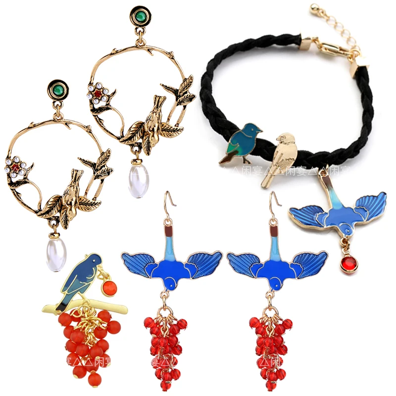 

Retro enamel oil pearl happy blue bird red fruit shirt brooch earrings nail bracelet