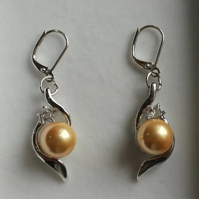 

New! 2014 noble 10mm yellow shell pearl earring