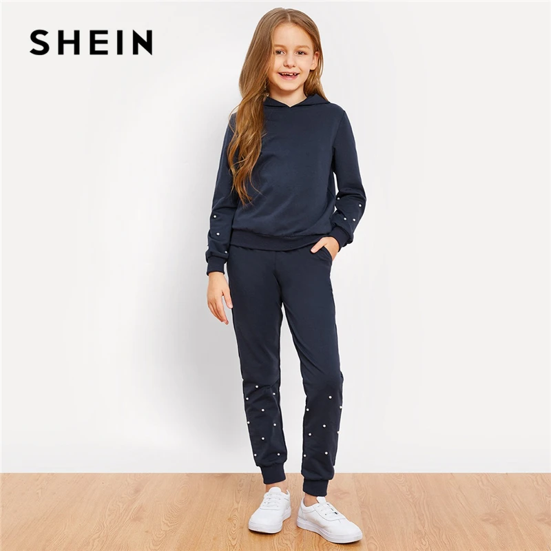 SHEIN Kiddie Girls Navy Pearl Beading Hoodie Casual Top And Pants Two Piece Set 2019 Spring Long Sleeve Children Clothes Set цена SHEIN Kiddie Girls Navy Pearl Beading Hoodie Casual Top And Pants Two Piece Set 2019 Spring Long Sleeve Children Clothes Set цены онлайн