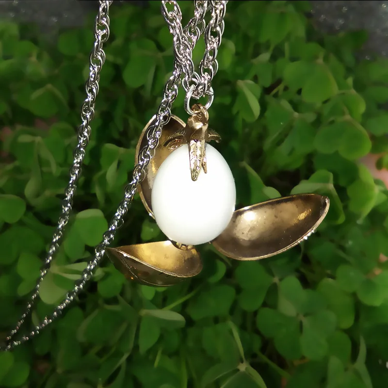 

The Lord of The Harrys Potters Restoring Fire Dragon Egg Time Converter Gothic Long Sweater Chain Drop Ship Wicca