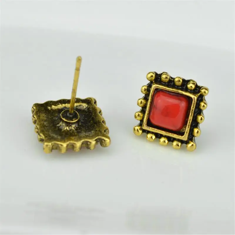 gold earrings stone