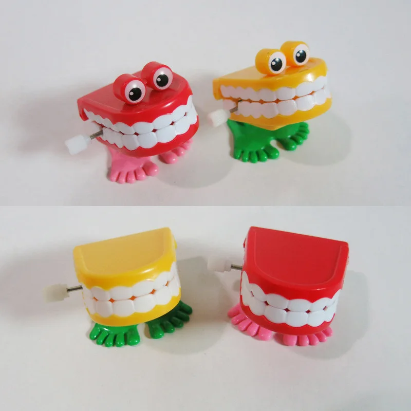 On Sale 12Units/lot Free Shipping Clockwork teeth Novelty toys Walking