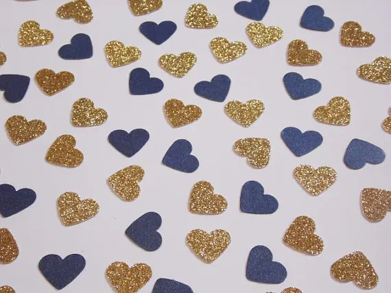 gold glitter and navy blue heart confetti wedding reception