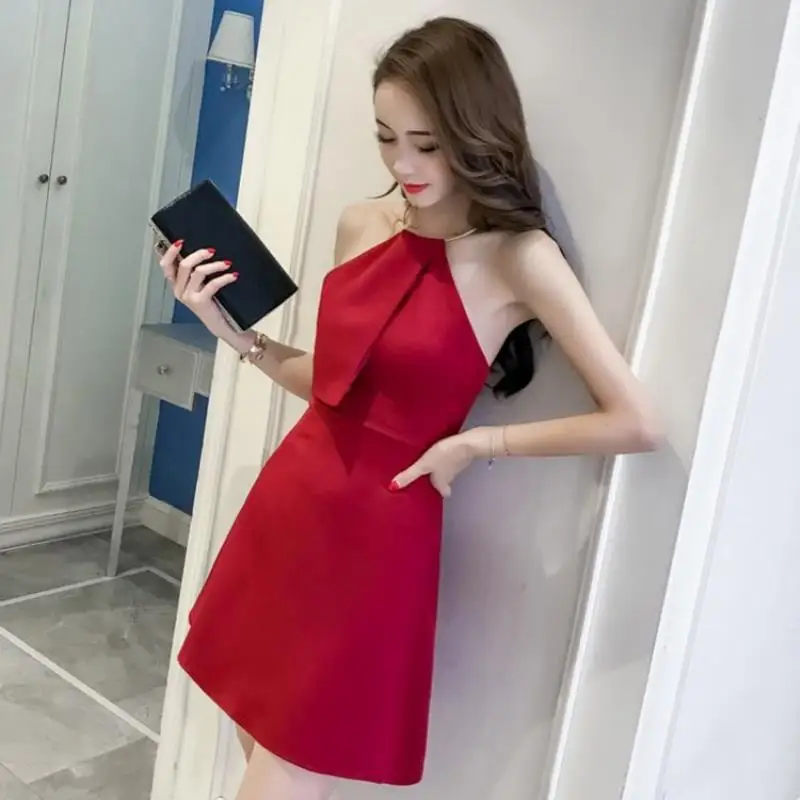 Summer new sexy back dress  metal ring hanging neck slim Asleeveless skirt 2018 Free Shipping