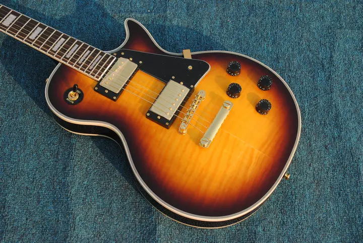 

New LP custom electric guitar, tobacco burst color.flamed maple top lp guitar With golden hardware, real guitar photo!