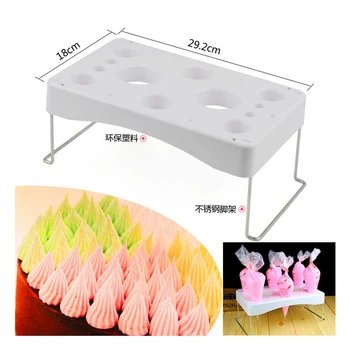 

Mounted cream framed bag nozzle mounted on a cake frame mounted on a flower